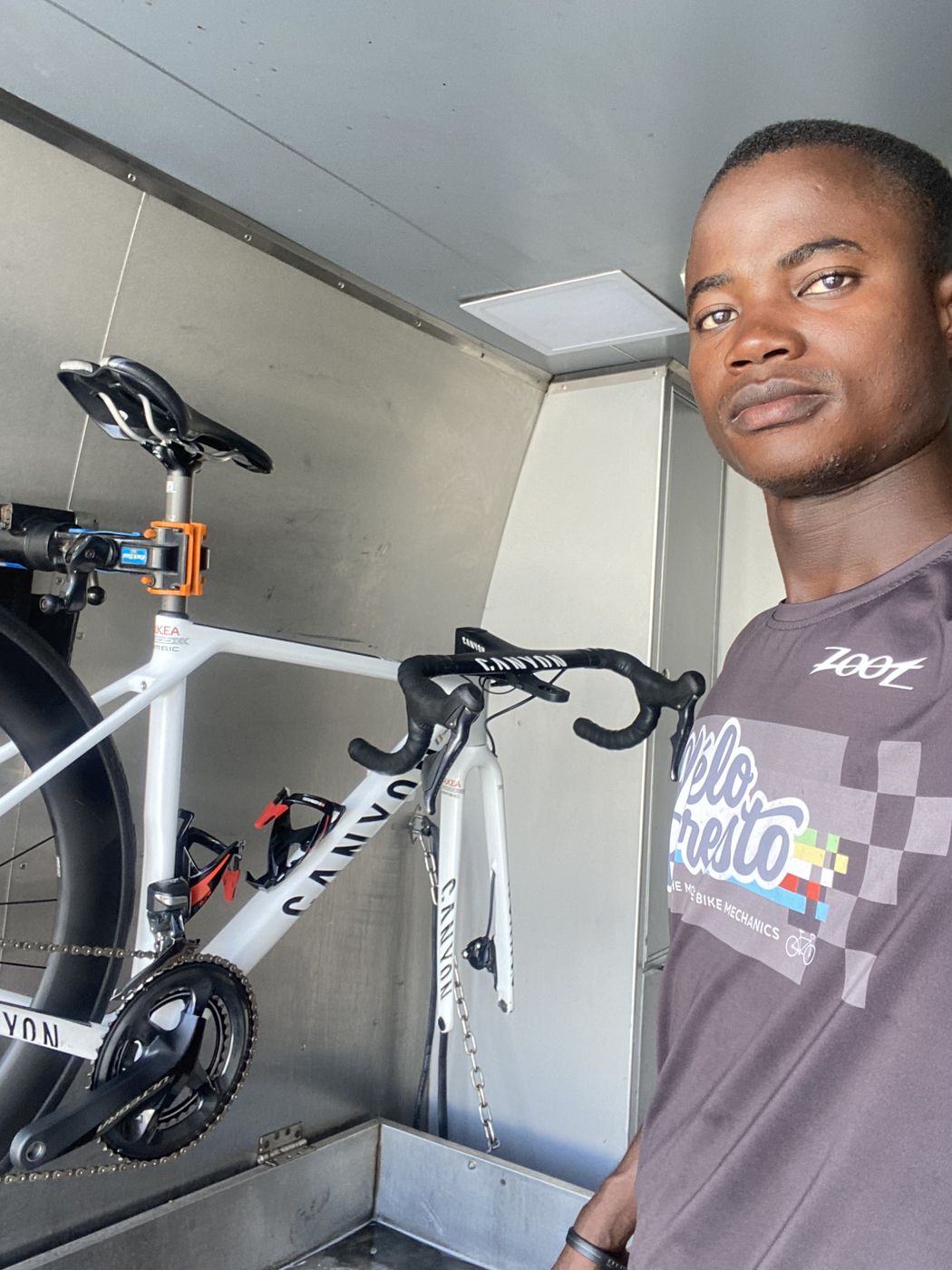 Ibrahim Jalloh at work on a bicycle in the workshop